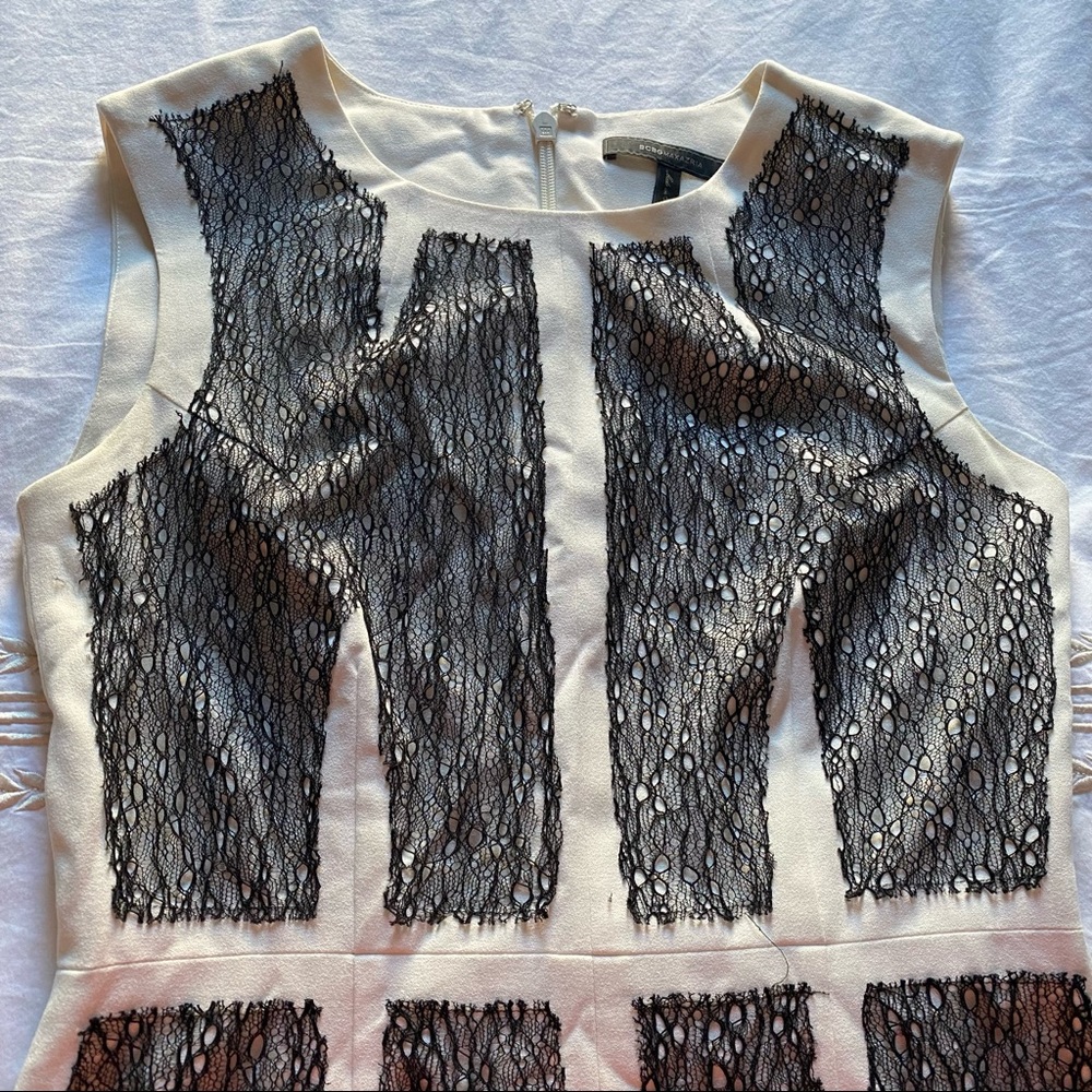 BCBG Max Azria, a-line dress with gorgeous black lace details. True to size.